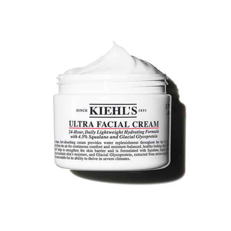 Tarro abierto de Ultra Facial Cream de Kiehl's mostrando su textura cremosa